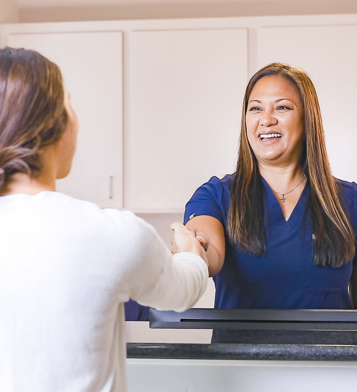 Staff greeting patient
